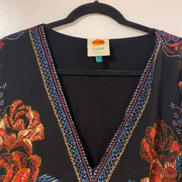 floral dress, sleeves that are made of a stretchy fabric. Tags off,  never worn - Picture 5 of 6